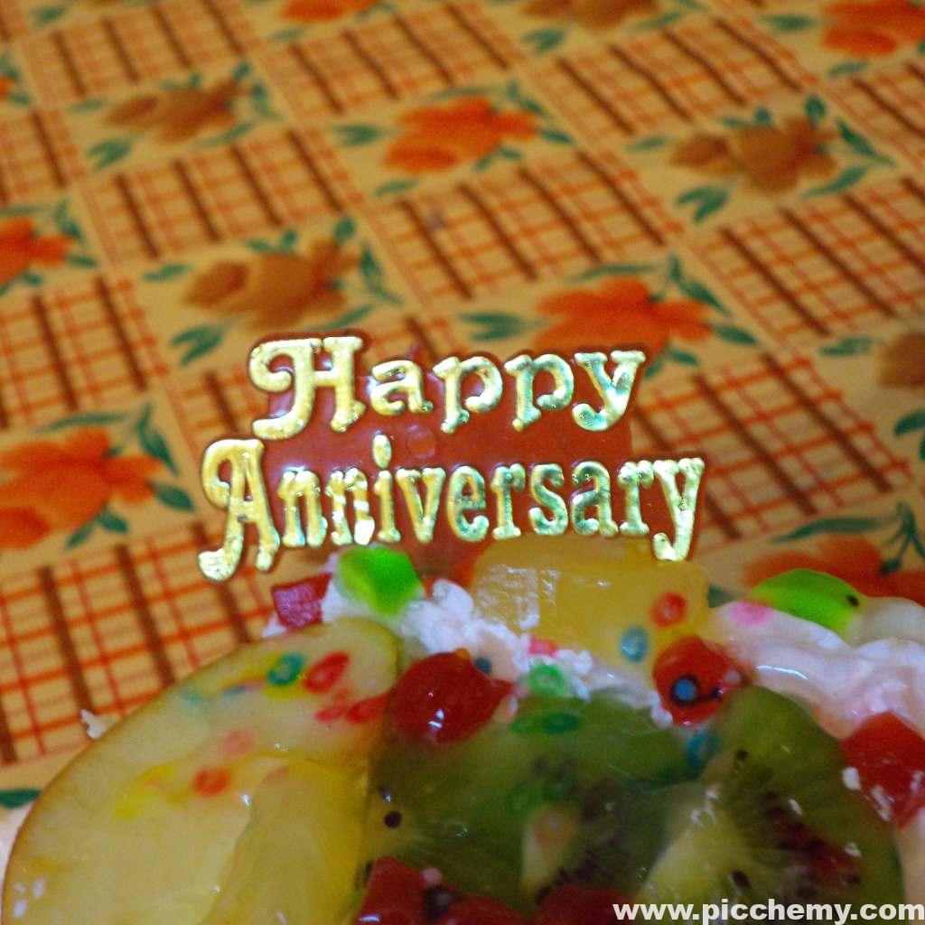 cake with fruits and cream Happy Anniversary