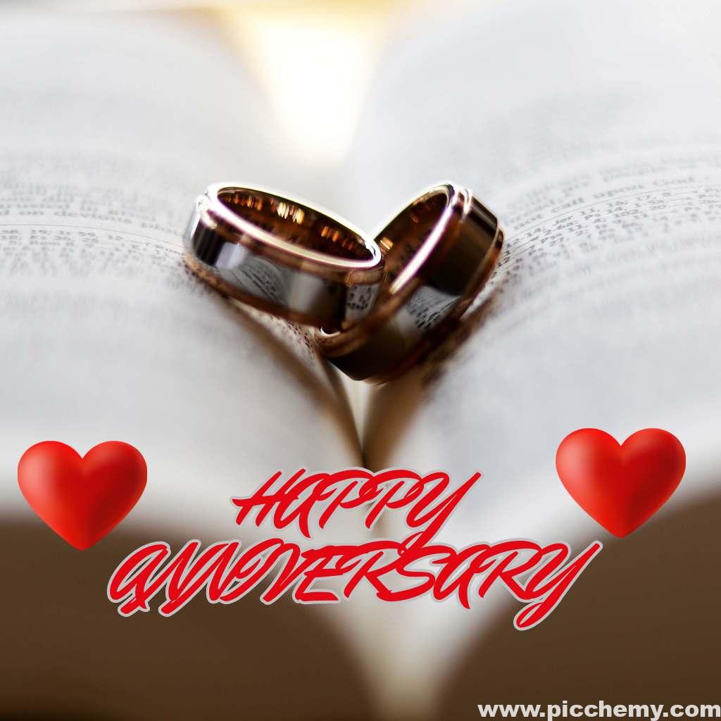 Engagement ring on the middle of the Book Happy anniversary image